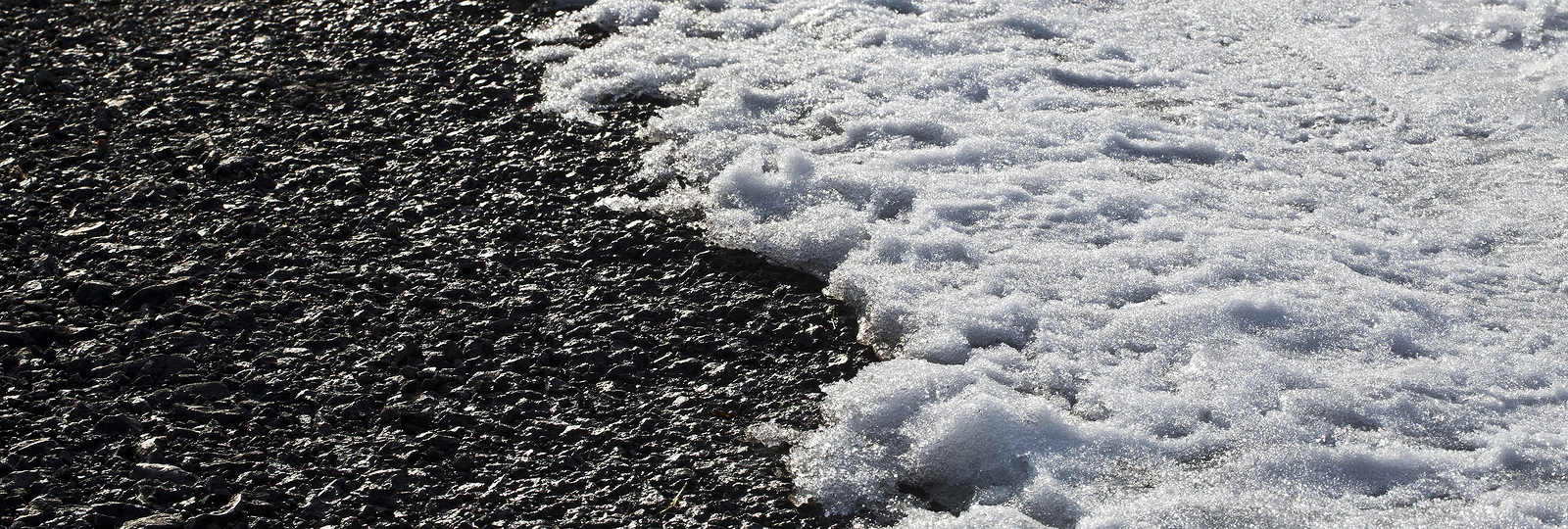 frozen winter asphalt road