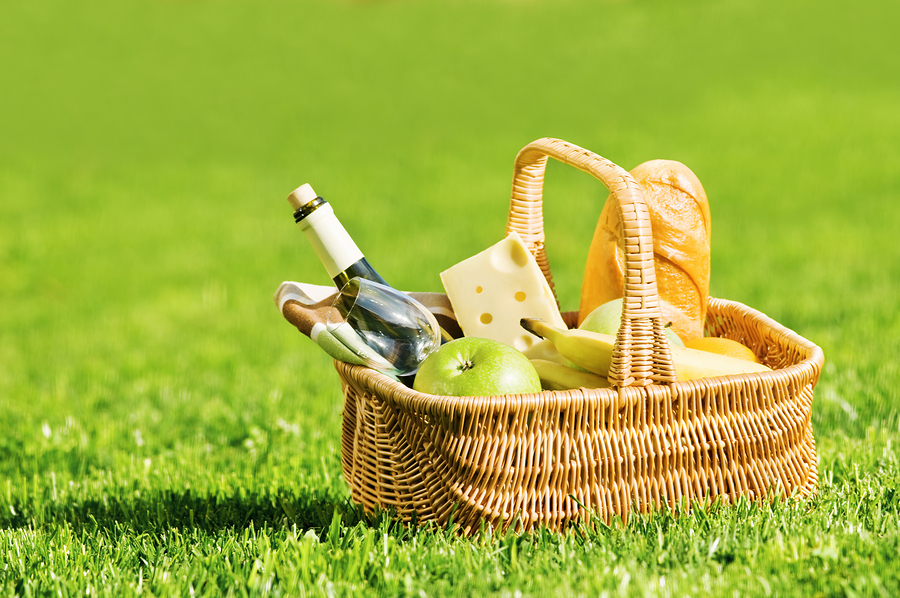 picnic basket with food and wine